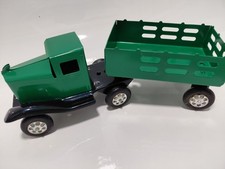 vintage 1930's Wyandotte metal truck with 2 trailers
