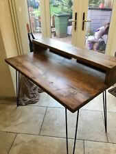 wooden desk with metal hairpin