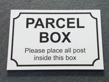 Parcel box sign post - /,