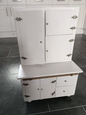 Toy kitchen cupboard from the 1950s with accessories