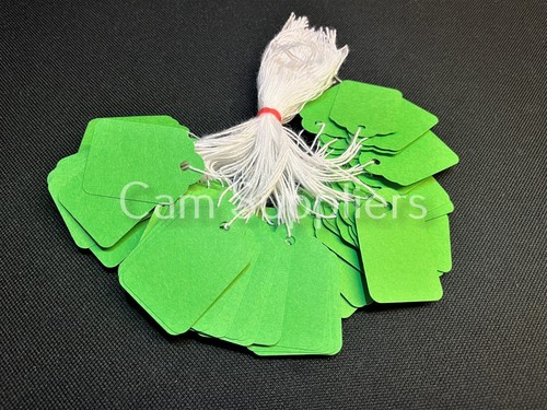 Green strung tie - on, tags