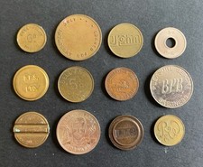 A Small Selection of 12 Gaming/Vending Machine Tokens. (1)