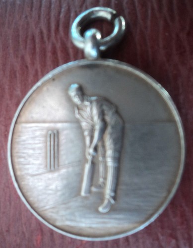 Silver cricket batsman medal - batsman,