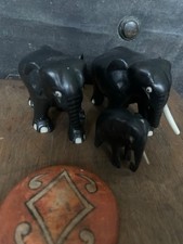 3 ebony elephants