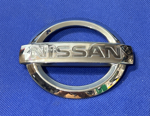 Nissan vintage car - car, badge