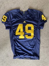 Michigan Wolverines University USA NFL NCAA American Football Jersey On Field 48
