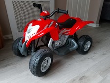 kids ride on red quad bike