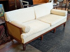 Vintage chinoiserie fabric sofa with elegantly carved hardwood frame