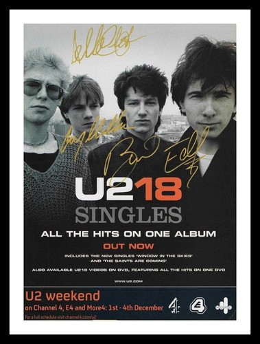 Entire band autographed - u2,