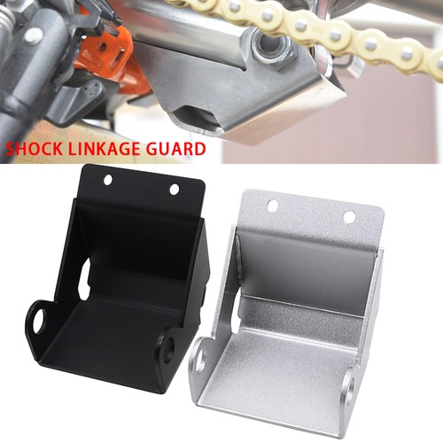 Rear suspension shock linkage - shock,