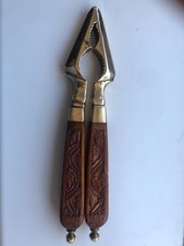 vintage brass and wooden handled nutcracker