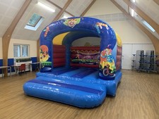 Circus themed Roofed Bouncy Castle 12x12ft with 1.5 Inflatable Fan
