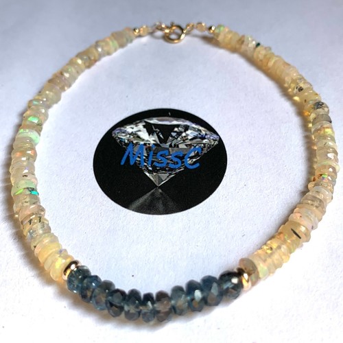 9ct gold fire opal and - 9ct, moss