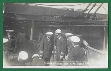 EARLY 20TH CENTURY WWI RP POSTCARD, RUSSIAN OFFICERS VISIT H.M.S. QUEEN MARY.