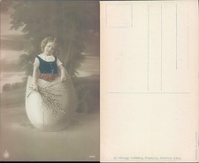 Child in egg shell with willow branches Polish American Publishing Company