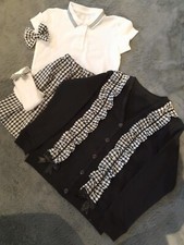 NEW WITH OUT TAG ..GINGHAM  BLACK SCHOOL SKIRT SET 9.10 YEARS