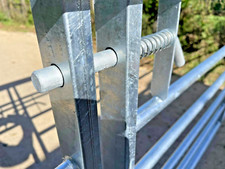 Farm gate spring slide bolt