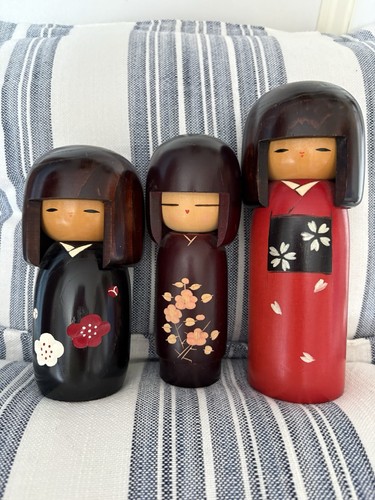 Three japanese wooden kokeshi - three,