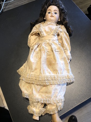 Old porcelan doll - old,
