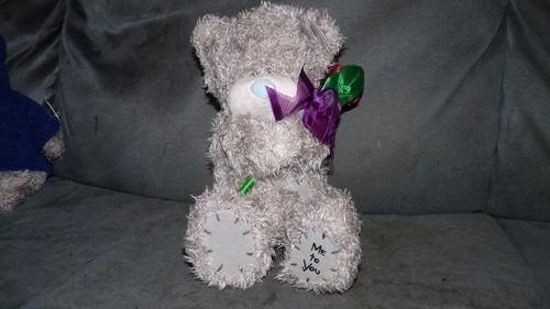 You bear holding a rose - bear,