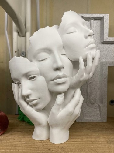 Printed faces sculpture - 3d,