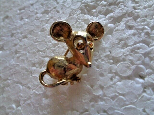 Mouse shaped gold coloued