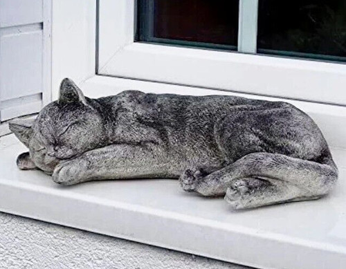 Laying sleeping cat figurine