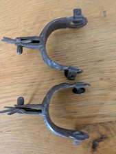 A Pair Of Small Western Style Spurs