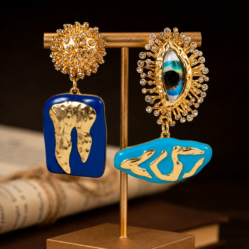 Schiaparelli asymmetrical gold - asymmetrical,