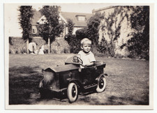 Vintage Photograph – Young Child Playing in Model Pedal Car or Similar