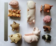 10 assorted pig ornaments /