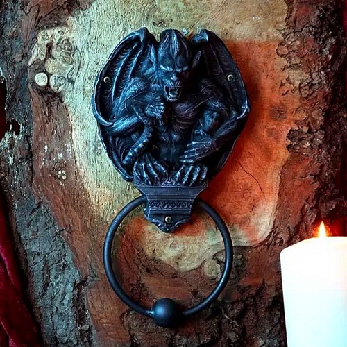 Grotesque greeting door - grotesque,