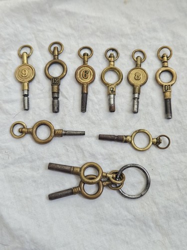 Pocket watch keys winding - watch, keys.
