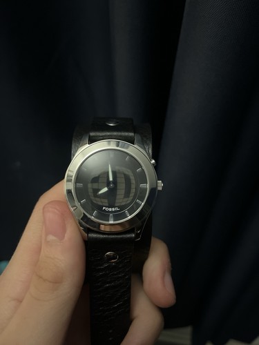 Fossil big tic scrolling - tic,