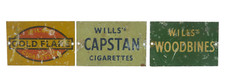 BASSETT LOWKE O GAUGE TIN SIGNS WILLS WOODBINES, CAPSTAN & GOLD FLAKE