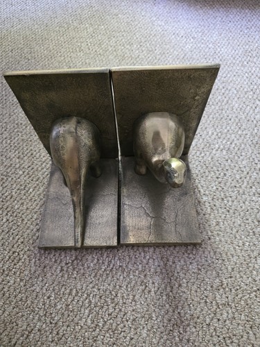 Pair dinosaur bookends - of, –
