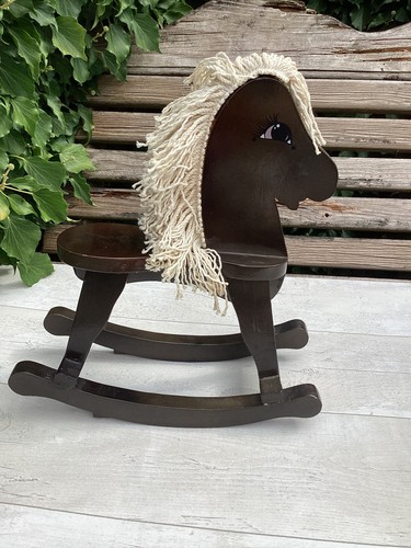 One wooden rocking horse - one,
