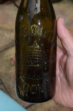 H. Gould London half pint mineral bottle.
