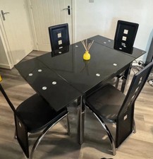 dining table and four chairs