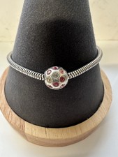 Chamilia Charm.  Pink and
