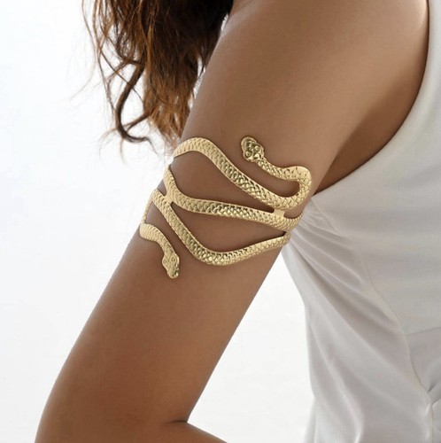 Gold coloured upper arm cuff - arm,