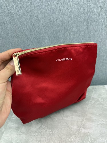 Red clarins toiletry pouch - red,