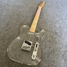 A beautiful, color-lit, good-looking acrylic electric guitar
