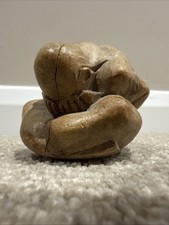 Small hand carved wooden yogi