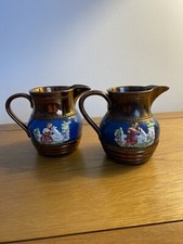 Pair of Decorated Copper