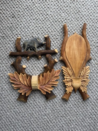 Two hand carved trophy - two,