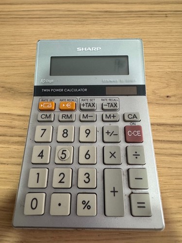 Sharp calculator elsi - sharp,