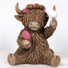 SITTING HIGHLAND COW  HAIRDO
