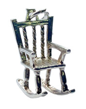 antique, vintage, old silver charm of a traditional rocking chair