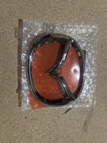 Genuine new mazda front badge - front,